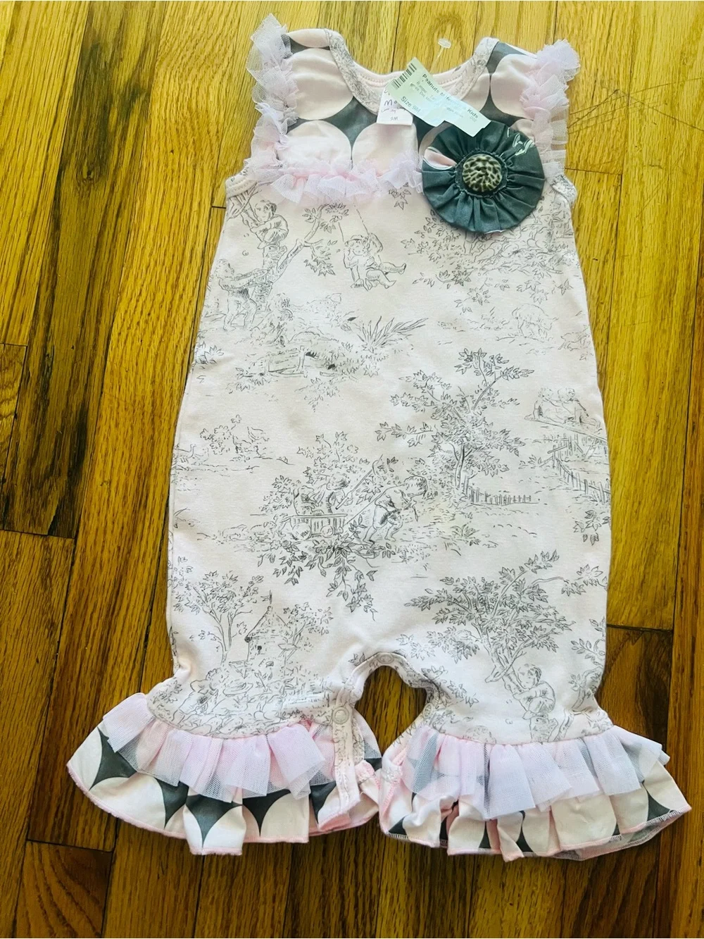 New Giggle Moon Pink Floral Ruffle Romper with Gray Bow Accent